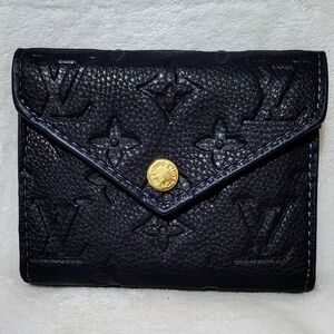 Louis Vuitton Black Wallet with Gold Accent